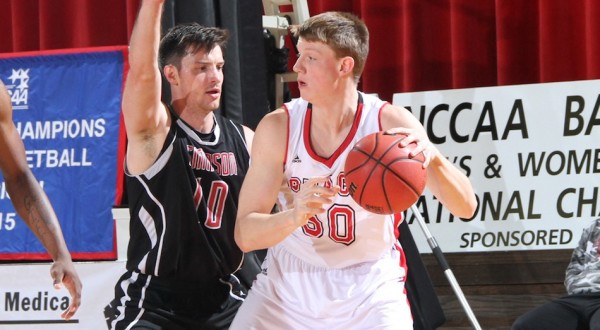 Erik Bowen of Grace College posts up Thursday during a win over Simpson in the NCCAA Championships at Grace (Photo provided by the Grace College Sports Information Department)