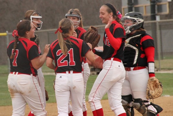 The Grace College softball team celebrates during a twin bill sweep of Huntington at home Wednesday (Photo provided by Brook Vosler)