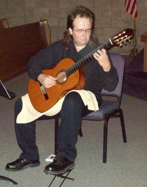 Scott Workman will present a classical guitar concert at Syracuse Public Library, at 6:30 p.m. April 20.