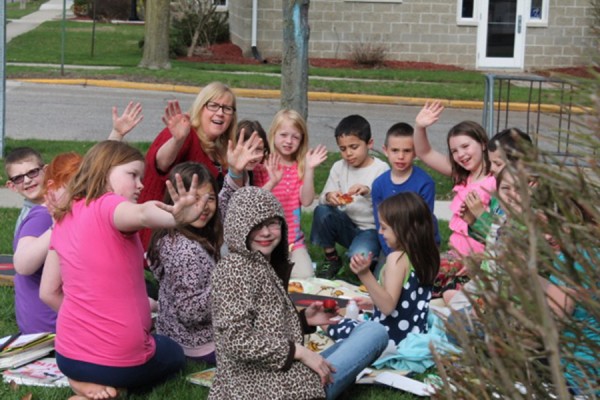 The Children’s Book Club had a fun meeting outside of the Syracuse Library on Tuesday, April 14. The kids were happy to make a few laps around the library before eating pizza and sharing stories from the books that they took home.