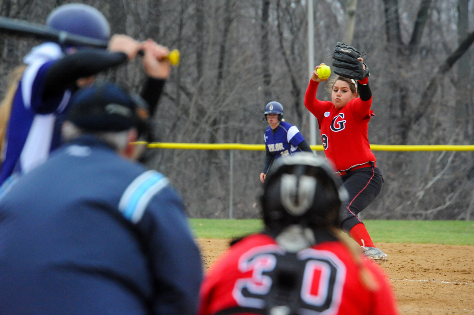 Grace pitcher Chandler Elliott deals to Taylor University during the first of two games Tuesday. (Photos by Mike Deak)