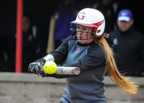 Hannah Herbster of Grace College makes contact against Taylor.