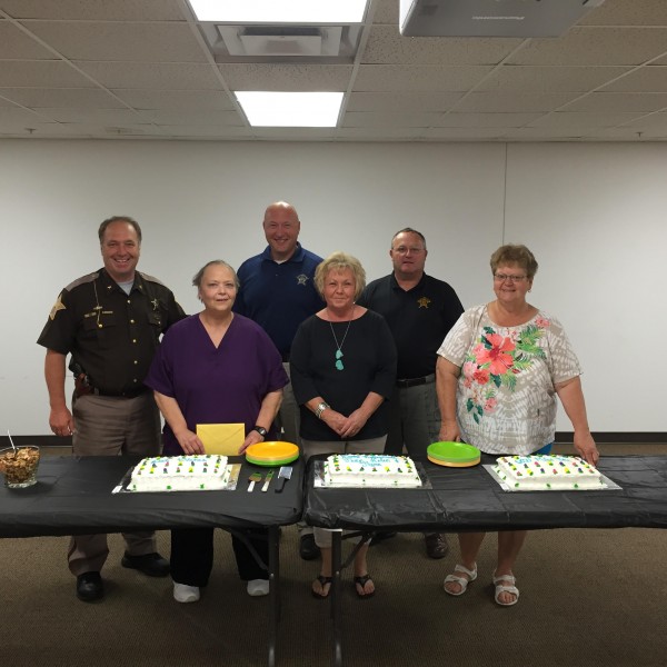 Left to right: Sheriff Aaron Rovenstine, Stoops, Jail Division Lt. Don Wiesehan, Tribalski, Work Release Director Lt. Larry Holderman, Sleeth). (Photo provided)