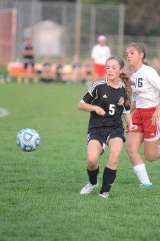 Brenna Shipley looks to gain possession for Warsaw.