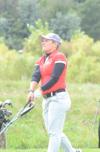 Linnzie Richner watches her tee shot Saturday. The NorthWood ace was medalist in the NLC Tournament.