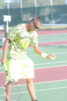 Nathan Perek readies to serve for Wawasee.