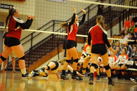 Plymouth's Erin Hunter, celebrates a point against Warsaw.