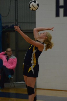 Carissa Urschalitz goes up to serve.