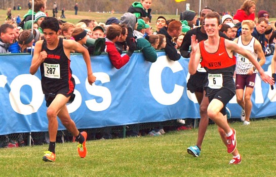 Warsaw freshman Zeb Hernandez (287) outkicks Avon's Rhys Grealish (6) on the homestretch of Saturday's IHSAA boys state cross country finals in Terre Haute. (Photo by Tim Creason)