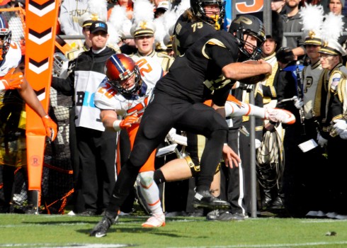 Purdue quarterback David Blough moves upfield.