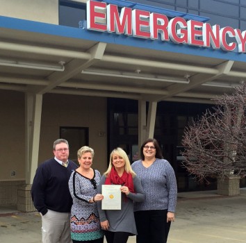 Displaying the advanced certification for primary stroke center are Dr. Kevin McGeehan, neurologist; Kim Finch, chief nursing officer, Kosciusko Community Hospital; Cindy Price, manager, KCH Emergency Care; Lynne Eberle, director, KCH Emergency Care.