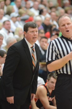 Warsaw coach Doug Ogle shares his opinion with an official.