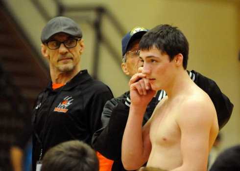 Kyle Hatch receives a little maintenance from Warsaw caretaker Reverend Roy Blake.