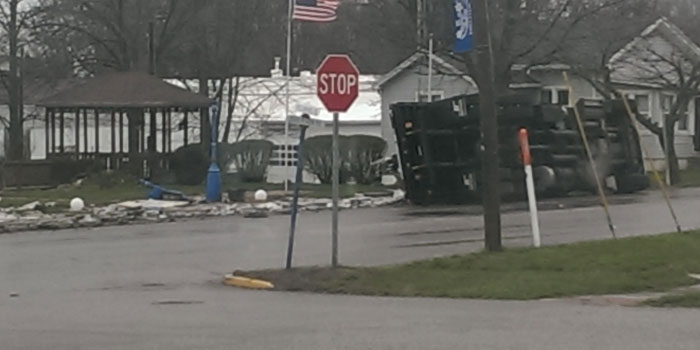 A semi-tractor lies on its side near Silver Lake. (Photo courtesy of Eric Baker)