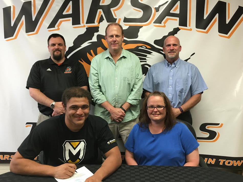 PICTURED, L-R Front Row: Andrew Brock, Sherri Brock; Back Row: Justin Smith (WCHS Wrestling Coach), Phil Jensen