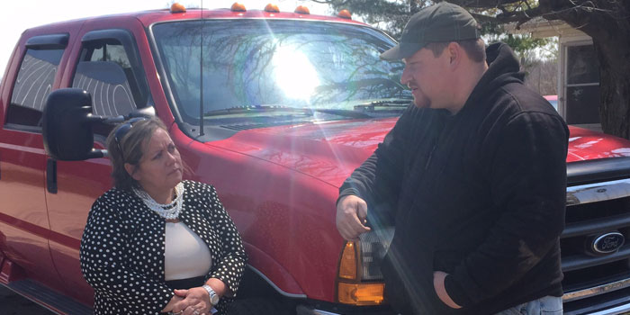 Candidate Joanna King talks with a local constituent about his concerns. (Photo provided)