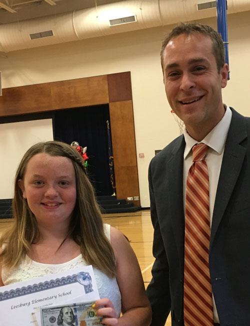 Brooklyn Gilstrap, left, and Warsaw Community Schools Superintendent Dr. David Hoffert