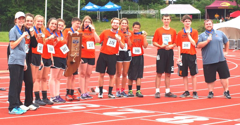 The Warsaw Unified Track team won its second state championship Saturday at the IHSAA state finals in Bloomington. Members of the championship team are (from left) Coach Julene Walker, Chandler Paul, Abna Federico, Emily Gilbertson, Alexa Balestri, Jeremy McCartney, McKenna Till, Cole Hoskins, Meredith Phipps, Jacob Green, Josh Jarrett, Thomas Boyer and Coach Sam Smyth (Photo by Tim Creason). 