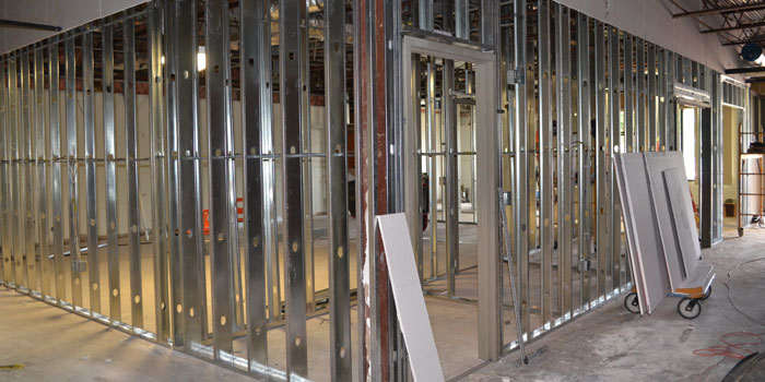 Metal framework at Edgewood Middle School shows where a classroom will soon be.