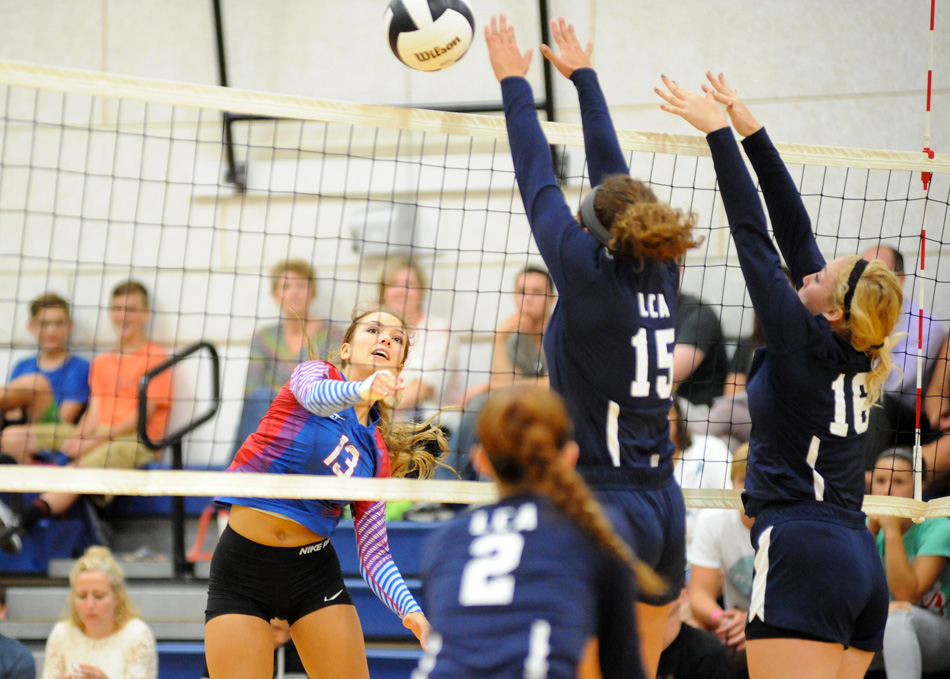 Whitko's Brianna Tackett hammers home a kill past two LCA blockers Tuesday night in Whitko's 3-0 win. (Photos by Mike Deak)