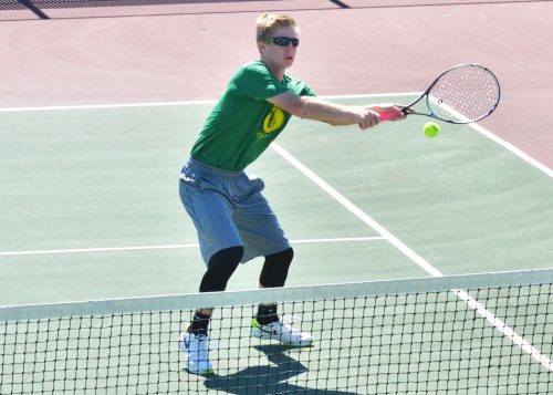 Tim Conley returns a ball during Saturday's contest against Jimtown. (Photos by Nick Goralczyk)