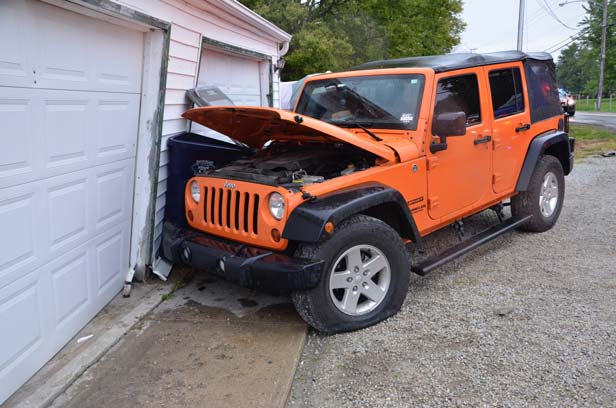 Damage to vehicle and garage.