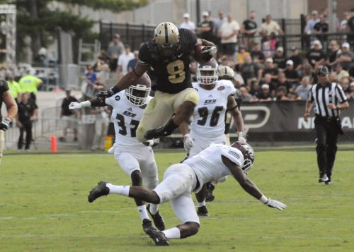 Purdue running back Markell Jones hurdles a Eastern Kentucky defender.