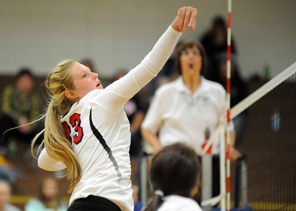 NorthWood's Haylee Pennington pushes an attempt over on Wawasee.