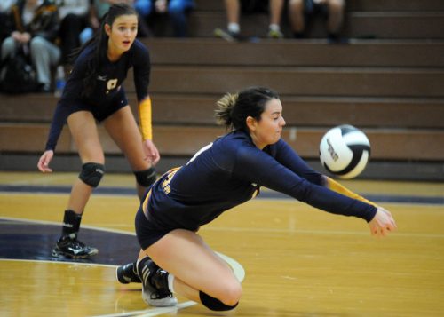 Fairfield's Makayla Bell hits the floor to set up a pass.