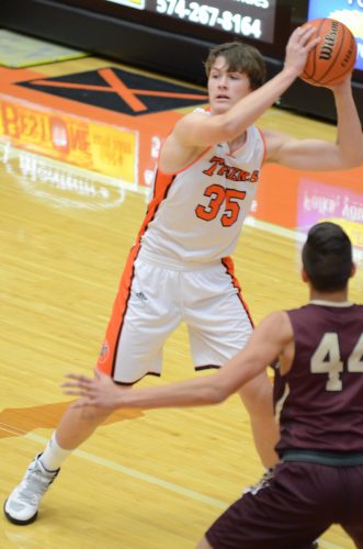 Asher Blum looks to pass the ball.