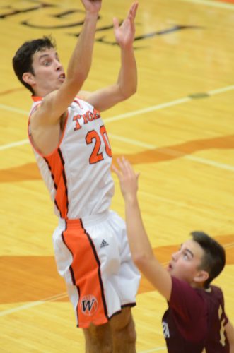 Ross Johnson released a jumper for the Tigers.