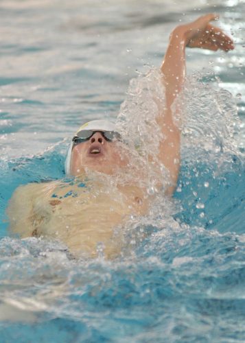 Jared Krugman does the backstroke during the 200 IM during Tuesday's meet with Memorial. (Photos by Nick Goralczyk)